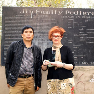 Irene Shaland and Mr. Jin at Jewish Cemetery in Kaifeng, China