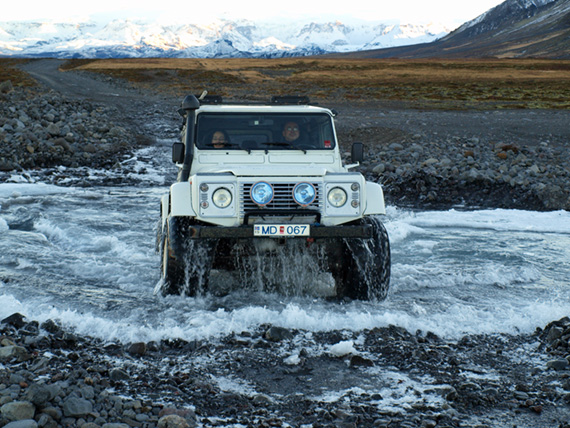 super jeep crossing stream in iceland