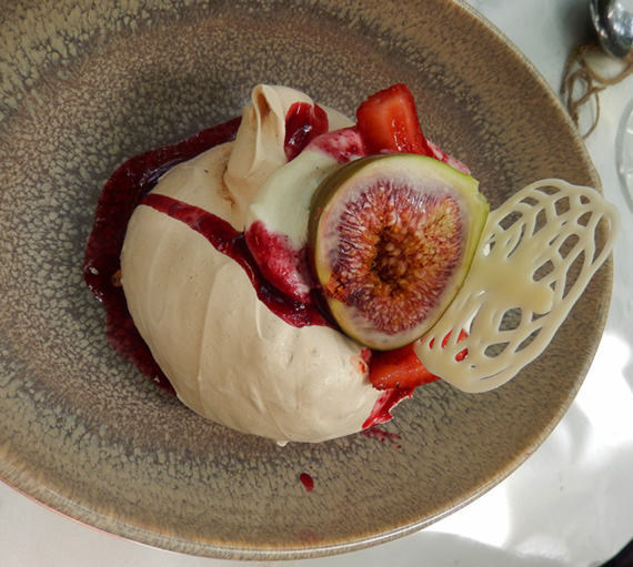 Divine dessert of raw sugar meringue with figs