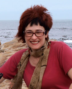 Irene Shaland standing at Cape of Good Hope, South Africa
