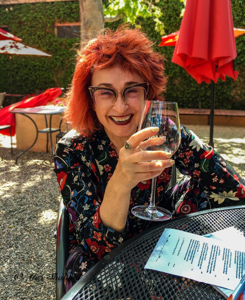 Irene Shaland drinks wine