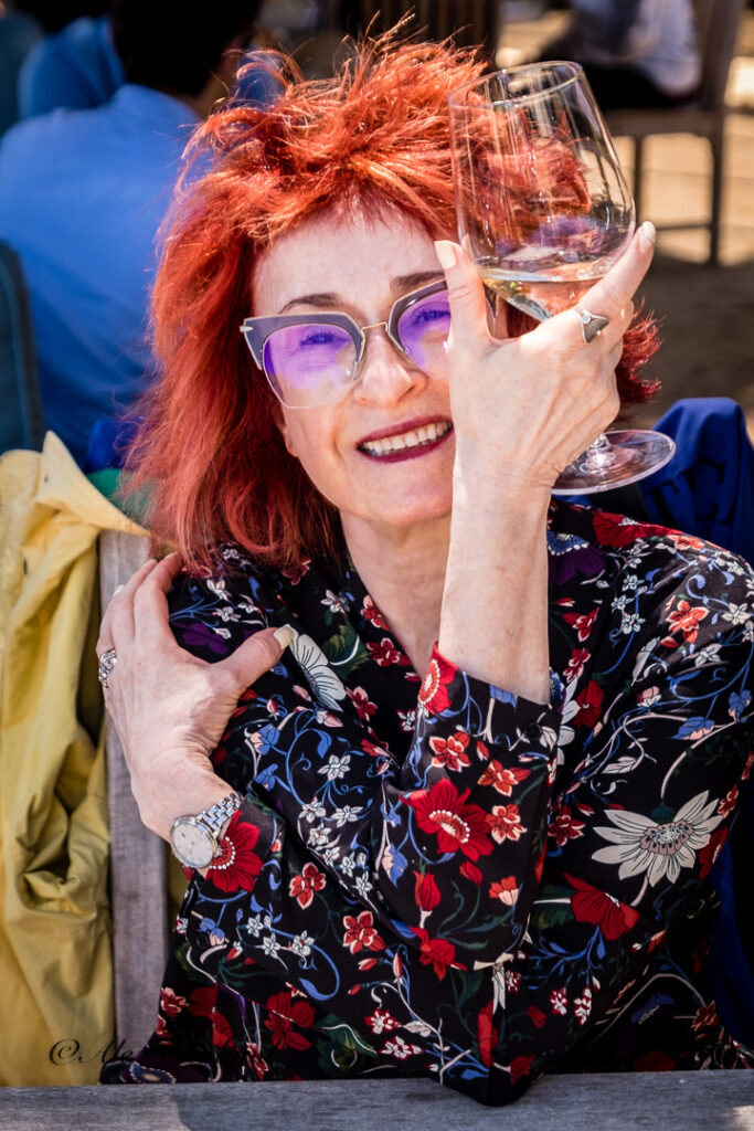 Irene Shaland with a glass of vine