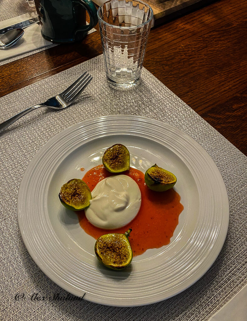 Caramelized fresh figs with raspberry coils and cream